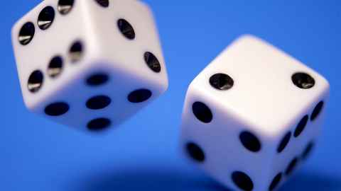 Two dice on a blue background