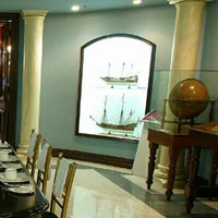 Boats beside dining table and globe